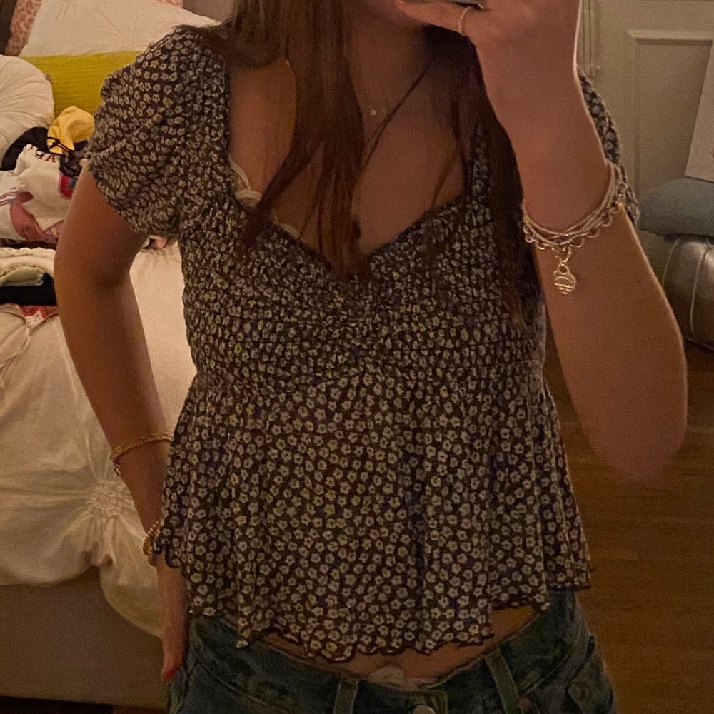 Dark navy blue top with small white flowers